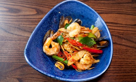 ‘Intense, seafood sweet and restorative’: seafood stir-fry.