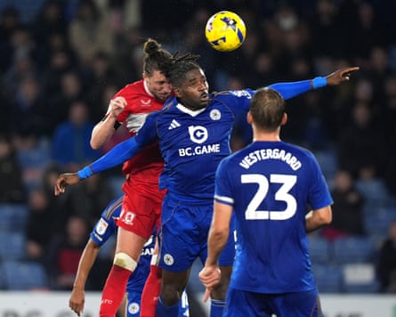 Middlesbrough’s Luke Ayling (left) rises highest to score his side’s ultra-late leveller at Leicester