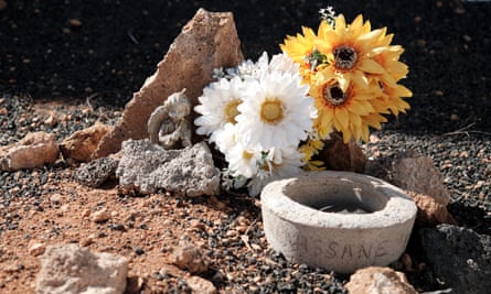 Flowers on the grave of a baby, Alhassane Bangoura, in Teguise, Lanzarote