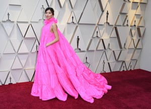 Gemma Chan was also feeling the fuchsia, this time in Valentino Couture. Don't be fooled by the ruff neck and matching clutch – the actor's tiered gown also came with practical pockets. Mary Queen of Scots, in which Chan stars, was nominated for both best costume design and best makeup and hairstyling.