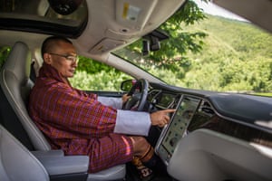 Bhutan’s prime minister, Tshering Tobgay, in his electric car