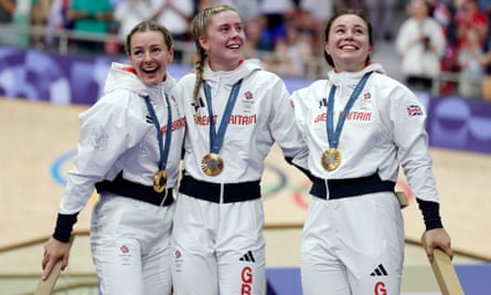 Katy Marchant, Emma Finucane and Sophie Capewell show their delight after Britain’s win in the women’s team sprint.