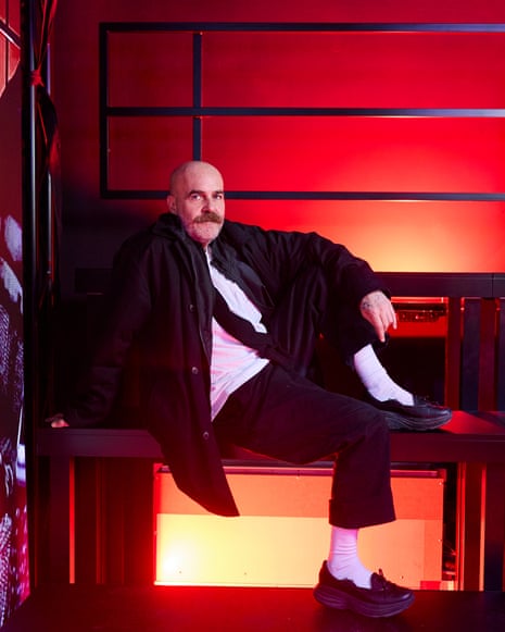 Andreas Angelidakis sat inside a contemporary art innstallation.