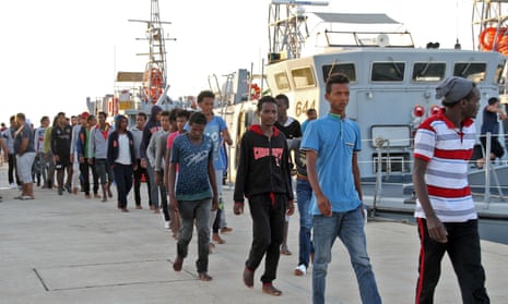 African migrants arrive at the naval base in Tripoli, the Libyan capital