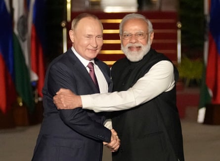 Russian President Vladimir Putin and Indian prime minister Narendra Modi greet each other in New Delhi on 6 December 2021.