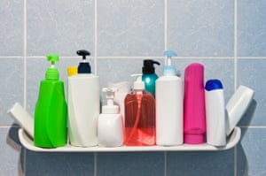 Several bottles of shower gel, shampoo and other washing products