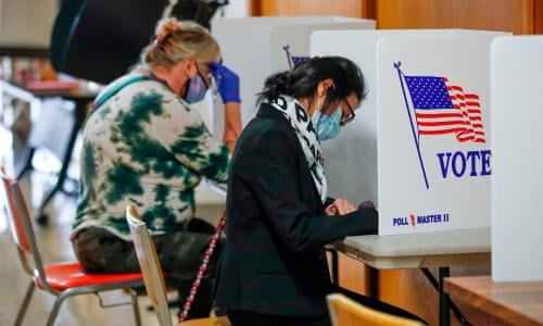 Wisconsin Sees Record Number Of Early Voters As Covid Cases Climb In State Us News The Guardian