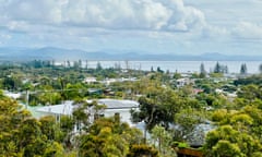 A view across Byron Bay rooftops to the ocean