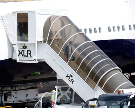 England's Elliot Anderson disembarks the plane after arriving at Birmingham Airport.