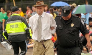 James Hansen is arrested outside the White House for protesting on 27 September 2010.