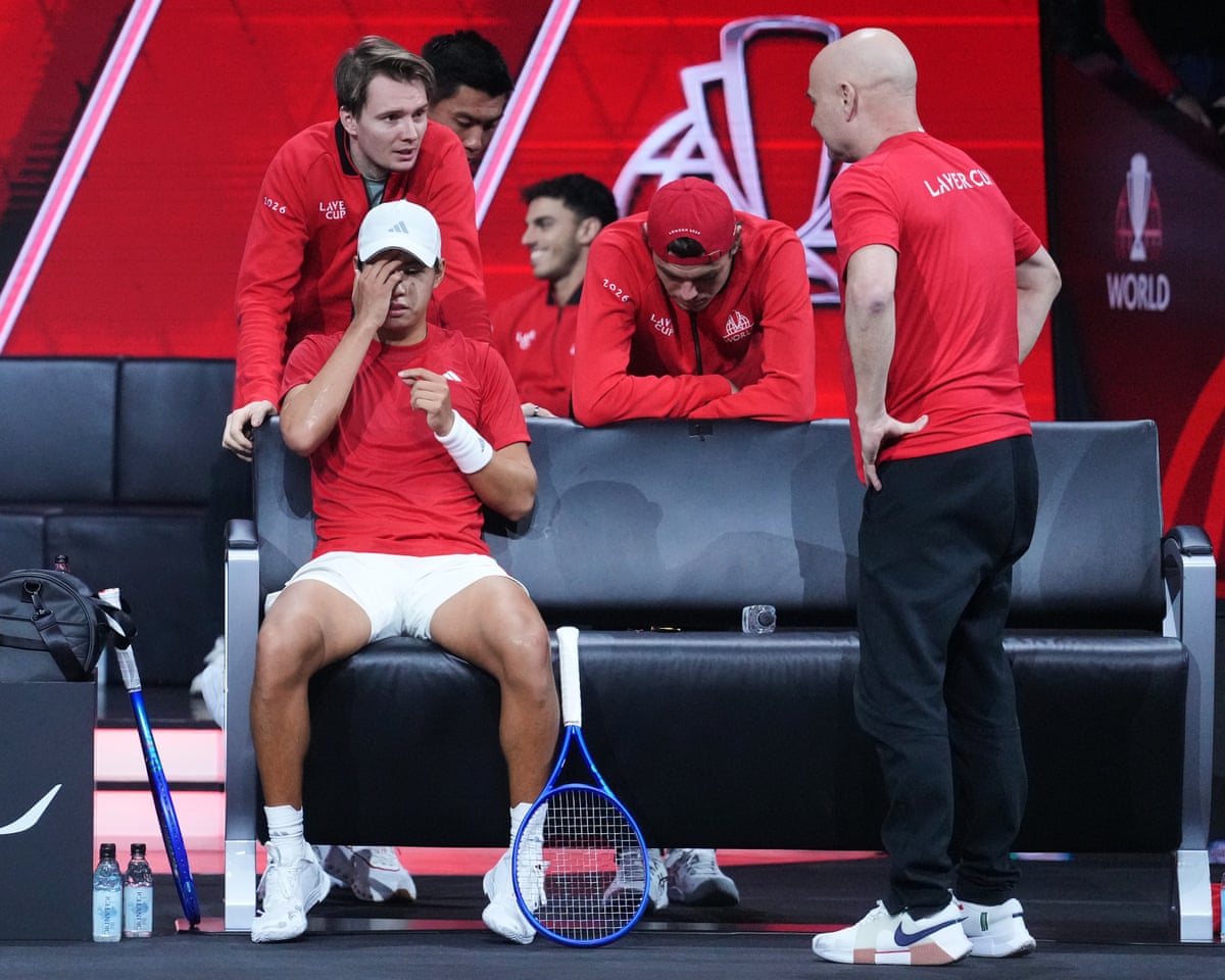 The Team USA Laver Cup captain, Andre Agassi, gives advice to his player Learner Tien during Tien's match against Team Europe's Flavio Cobolli.