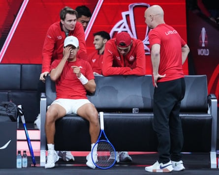 The Team USA Laver Cup captain, Andre Agassi, gives advice to his player Learner Tien during TienâÂÂs match against Team EuropeâÂÂs Flavio Cobolli.