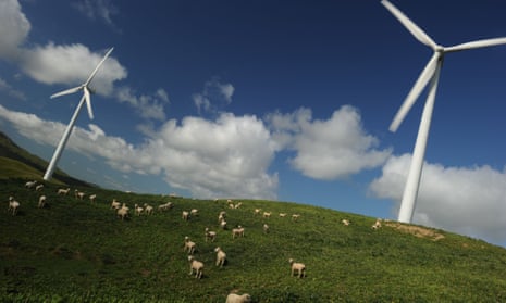 Sheep graze under wind turbines at Te Apiti wind farm in Manawatu Gorge, 10 kilometres from the city of Palmerston North during the 2011 Rugby World Cup on September 28, 2011. TOPSHOTS AFP PHOTO/Peter PARKS (Photo credit should read PETER PARKS/AFP/Getty Images)