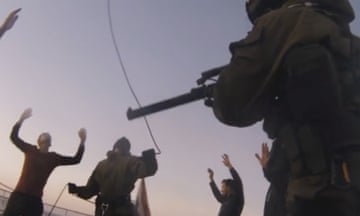 The moment armed Russian agents seize the Arctic Sunrise, caught on Greenpeace film