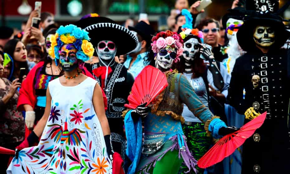 People dressed as 'Catrina' for Day of the Dead parade in Mexico City, Mexico.