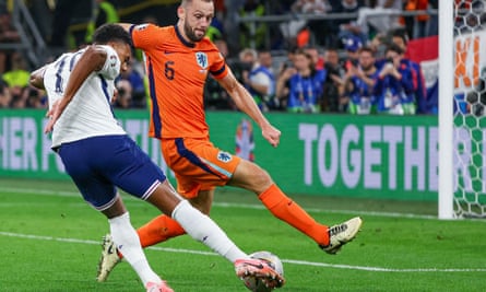 Ollie Watkins shoots past Stefan de Vrij to score England’s last-gasp winner against the Netherlands in the semi-final.