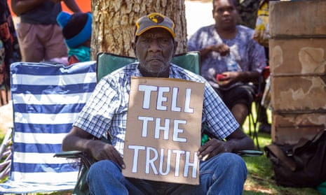 NT police shooting: Quentin Walker Jurrah, whose grandson Kumanjayi Walker was killed on Saturday, demonstrates outside Alice Springs police station during a second day of protests on Tuesday.