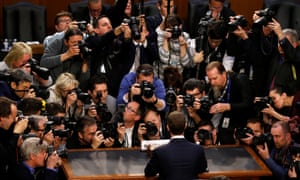 Facebookâs chief executive, Mark Zuckerberg, faces the cameras as he arrives to testify before a US Senate joint hearing on Capitol Hill in Washington.