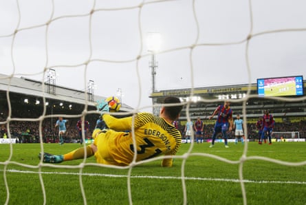 Luka Milivojevic has his penalty saved by Ederson.