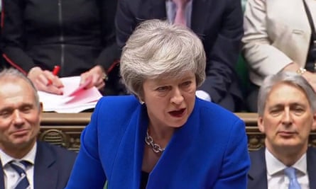 A divided house … Theresa May during PMQs in Westminster.