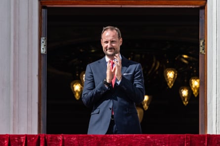 Haakon on a royal palace balcony