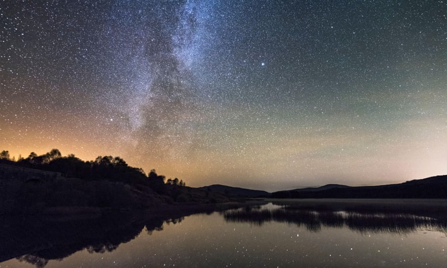 Milky Way and stars over Loch Stroan, Galloway Dark Sky Park, Galloway Forest