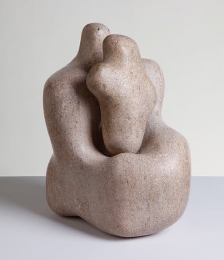 Two pink Ancaster stone figures intertwined.
