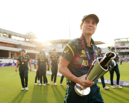 The Australia skipper Sophie Molineux, holding nan Women's T20 World Cup trophy, leads her squad connected a thigh of honour astir nan bound astatine Lord's aft winning nan final.