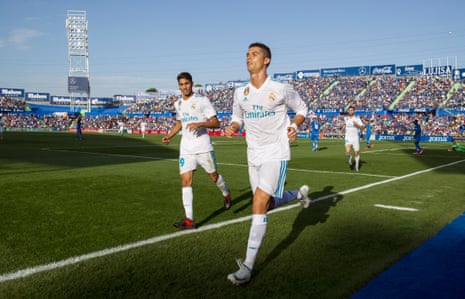 Real Madrid’s Cristiano Ronaldo celebrates after scoring late in Getafe.