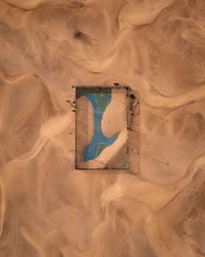 Urban. Runner up: After Sand Storm by Yura Borschev  A basketball court after a sand storm in the United Arab Emirates. The sand is partially covering the field, letting the viewer get a glimpse of its original shapes and colours. It is one of the greatest finds in the author’s sport courts collection shot in 2021