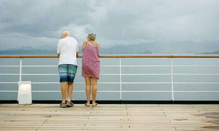 A couple check out the view from on deck.