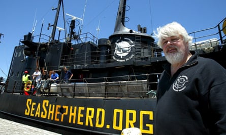 Paul Watson stands in front of a Sea Shepherd ship