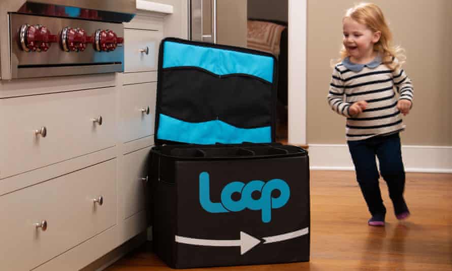 A child passes a Loop container