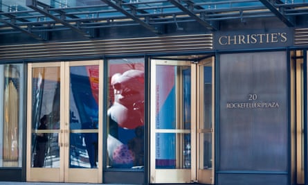 rat’s reflection in glass door at Christie’s