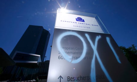 The word ‘No’ in Greek is daubed over the sign for the new European Central Bank (ECB) headquarters during a demonstration in Frankfurt, Germany, June 30, 2015