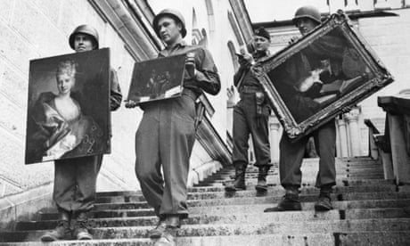 American soldiers recover paintings looted by the Nazis at Füssen, Germany in May 1945.