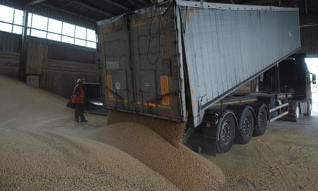 A truck unloads grain at a port in Izmail, Ukraine, in April