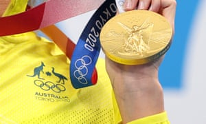Australian swimmer Emma McKeon with one of the gold medals she has won at the Tokyo Olympic Games.