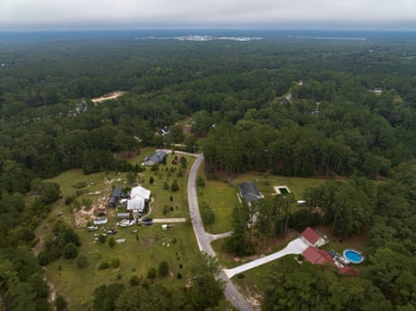 Mike Watters’s home (left) is only a mile from Chemours/DuPont plant property on the horizon.