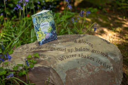 Armitage’s new book, Dwell, on a rock with lines of poetry carved on it