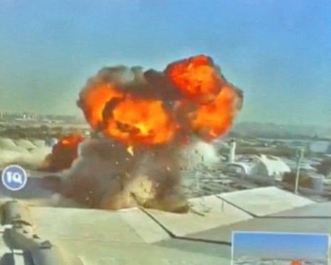 CCTV footage shows fire and smoke rising after the strike on Kuwait international airport in Kuwait City.