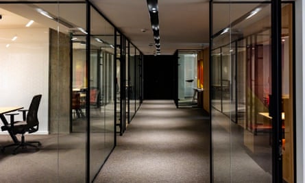 Empty corridor in modern office building at nightEmpty company office in time of coronavirus quarantine.