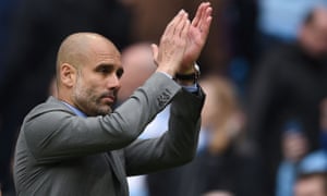 Pep Guardiola applauds the Manchester City