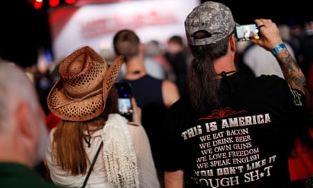 Supporters listen to Donald Trump deliver remarks at the NRA Leadership Forum in Atlanta.