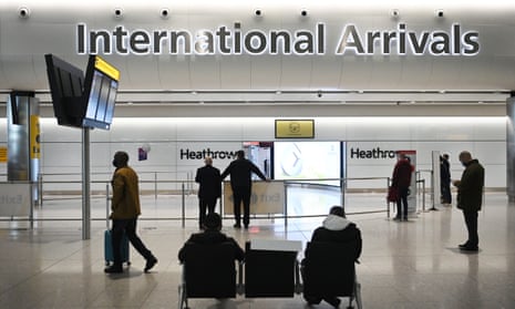 Travellers in the arrivals area of Heathrow