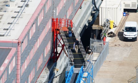 People boarding the Bibby Stockholm at Portland Port in Dorset on 16 August 2023.