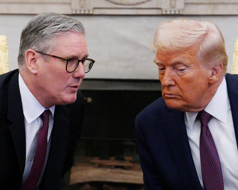 Keir Starmer and Donald Trump sitting down and leaning towards each other at the White House