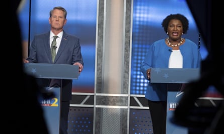Brian Kemp, left, and Stacey Abrams, right, are two politicians who have pledged to adopt the Carter Center’s principles to uphold trusted elections.