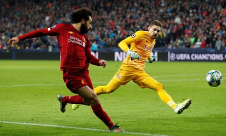 Mohamed Salah guides in Liverpool’s second goal from a remarkably acute angle after going round Salzburg’s Cican Stankovic.