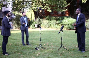 Kwasi Kwarteng (right) giving an interview in London this morning.